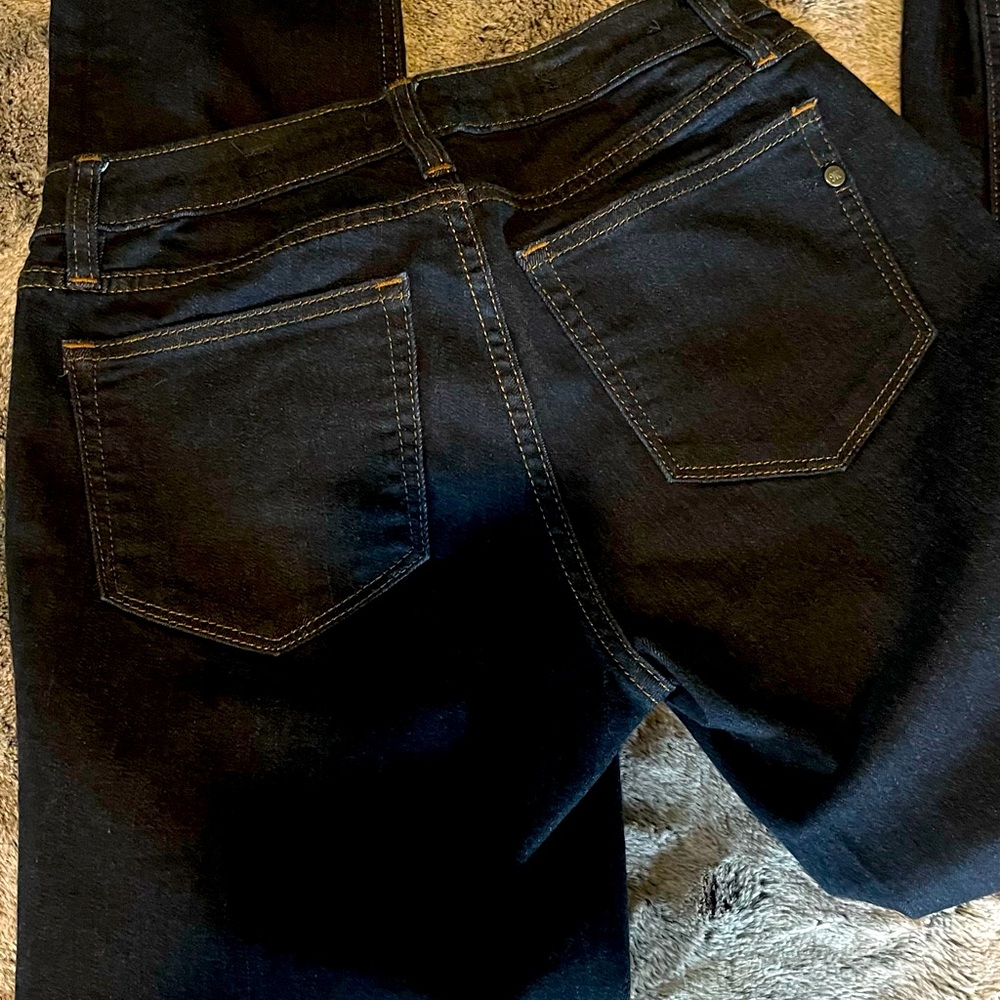 Miss Me straight dark blue jeans.